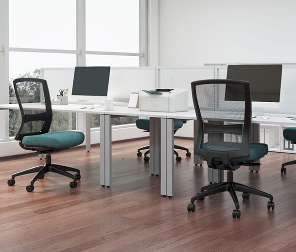 Custom upholstered Buro Mentor mesh back chairs in open plan office scene 