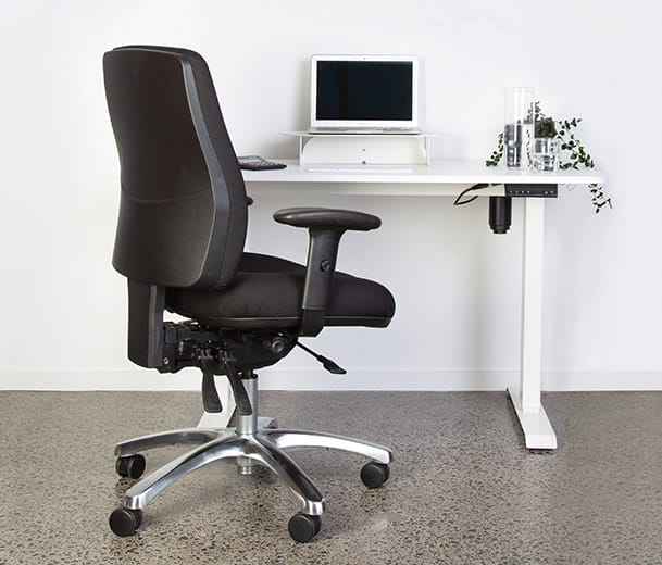 Buro Roma 24/7 High Back ergonomic office chair at a height adjustable desk