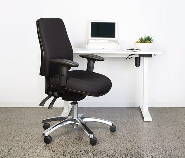 Buro Roma 24/7 High Back ergonomic office chair at a height adjustable desk