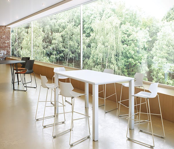  Konfurb Fly Swivel barstools around a table in collaborative office scene