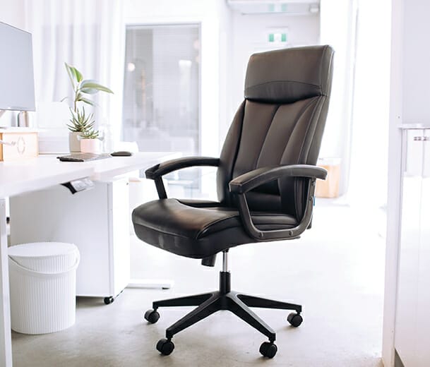 front angle of the Buro Dakota II black executive chair in office