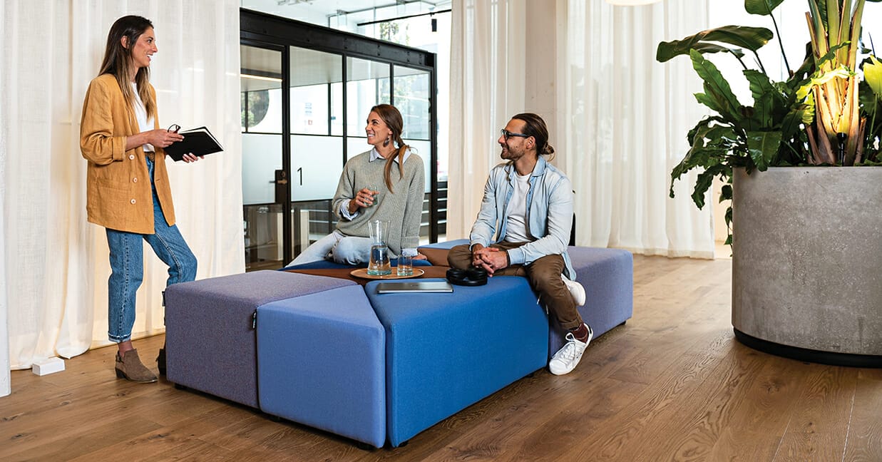 workers socialising on the konfurb eightby4 soft seating