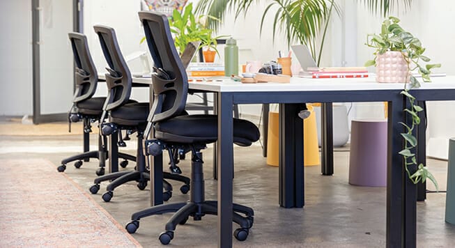 mondo java mesh black chairs at fun office coworking desk