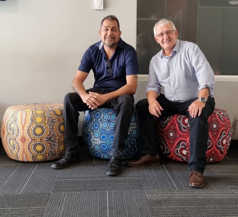 clive and kevin sitting on Konfurb Halo with six seasons fabric upholstery